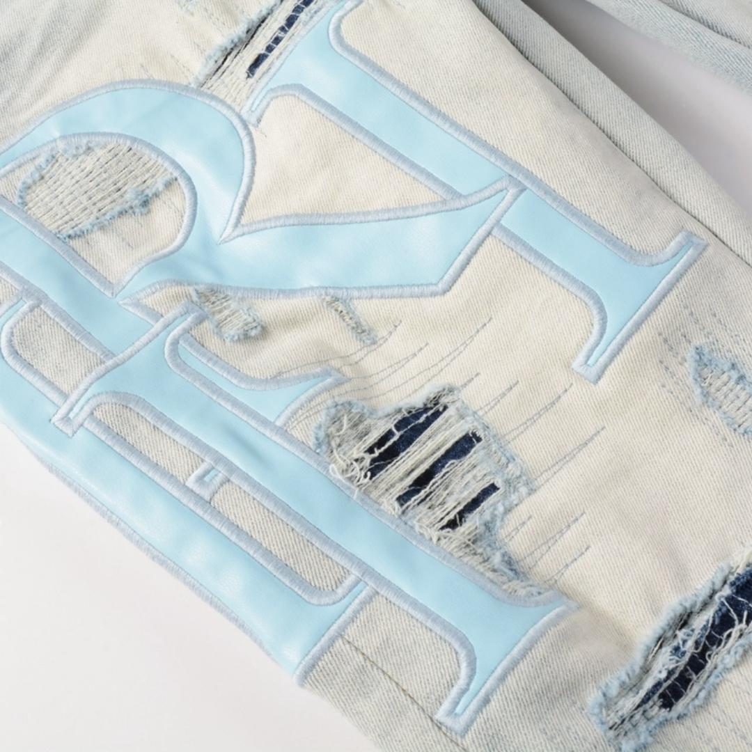 Light Wash Staggered Rip Jeans