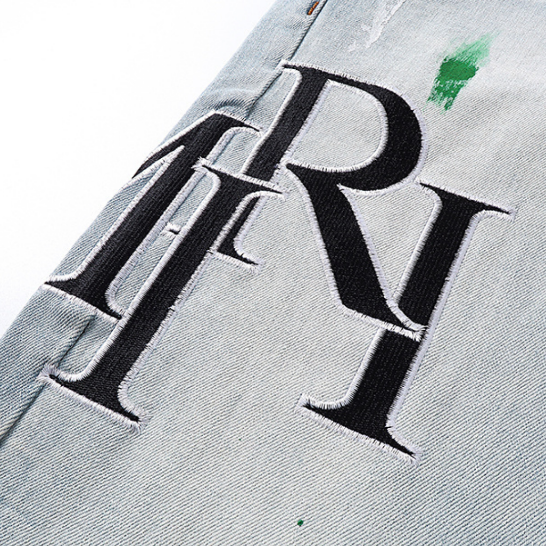 Light Blue Paint Splatter Logo Jeans