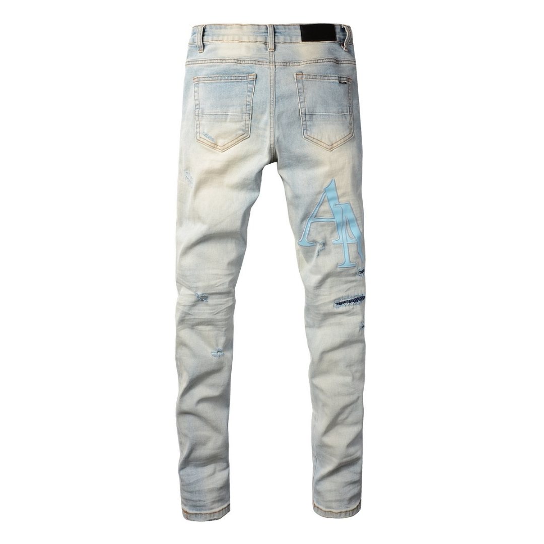 Light Wash Staggered Rip Jeans